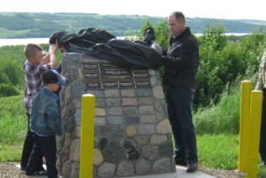 Lorne Topley's son, Ryan, and grandsons, Austin and Mason, Unveil Cairn